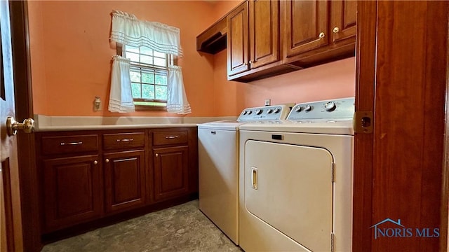 12327 Buckeye Dr, Paulding, OH 45879 - washroom with independent washer and dryer and cabinet space