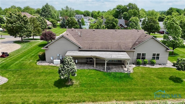 12327 Buckeye Dr, Paulding, OH 45879 - back of property with a yard