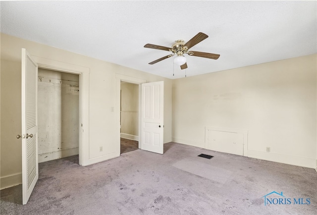446 Center St, Findlay, OH 45840 - unfurnished bedroom featuring carpet floors, a ceiling fan, baseboards, and a closet