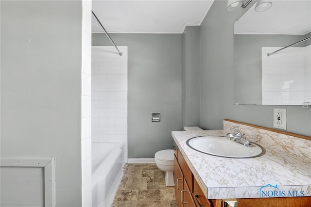 446 Center St, Findlay, OH 45840 - bathroom with vanity, baseboards, toilet, and washtub / shower combination