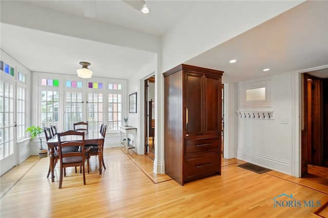 1100 S Main St, Findlay, OH 45840 - dining space with light wood finished floors and baseboards