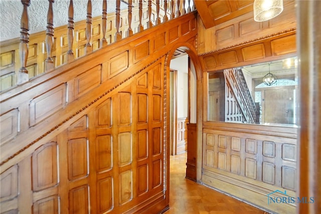 1100 S Main St, Findlay, OH 45840 - entryway featuring a decorative wall, wainscoting, and arched walkways