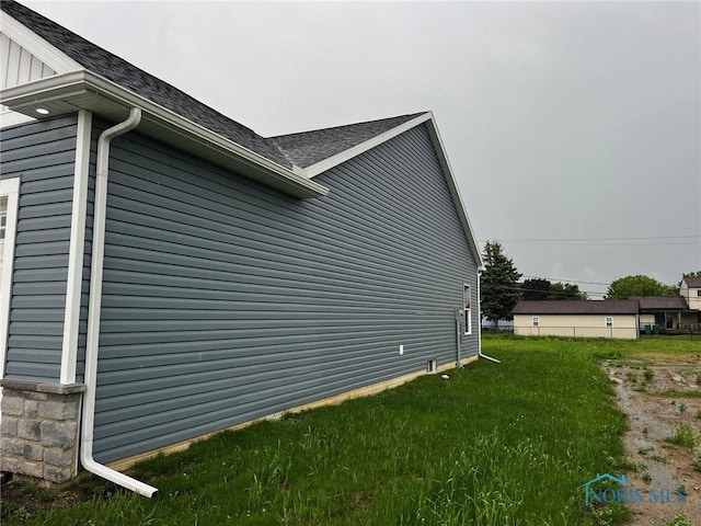 4015 E Plaza Blvd, Northwood, OH 43619 - view of home's exterior with a shingled roof