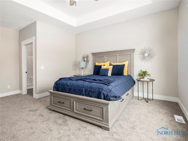 4015 E Plaza Blvd, Northwood, OH 43619 - carpeted bedroom with baseboards and ceiling fan