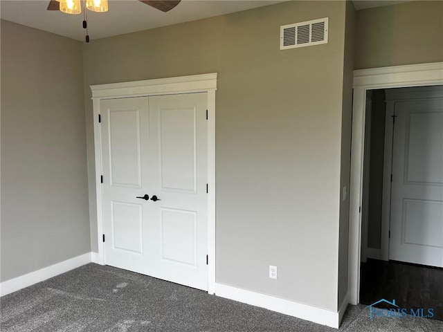 4015 E Plaza Blvd, Northwood, OH 43619 - unfurnished bedroom featuring baseboards, carpet, and a closet