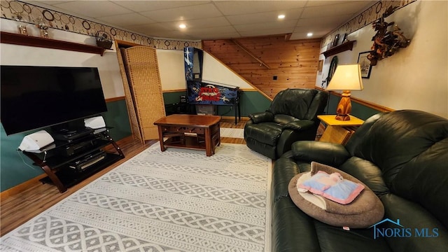 17884 Euler Rd, Bowling Green, OH 43402 - living room with wood finished floors, baseboards, a paneled ceiling, wooden walls, and recessed lighting