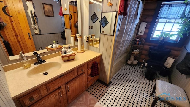 17884 Euler Rd, Bowling Green, OH 43402 - bathroom with vanity, shower / tub combo with curtain, and wainscoting