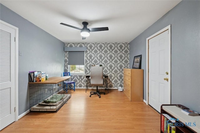 2222 Talmadge Rd, Ottawa Hills, OH 43606 - office area featuring an accent wall, wallpapered walls, wood finished floors, a ceiling fan, and baseboards
