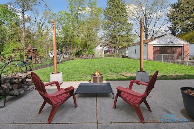 2222 Talmadge Rd, Ottawa Hills, OH 43606 - view of patio / terrace with an outdoor fire pit and a playground