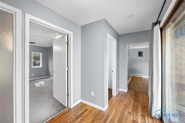 4550 W Sylvania Ave, Toledo, OH 43623 - hall with light wood-style flooring and baseboards