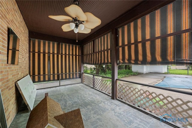 4550 W Sylvania Ave, Toledo, OH 43623 - unfurnished sunroom featuring ceiling fan