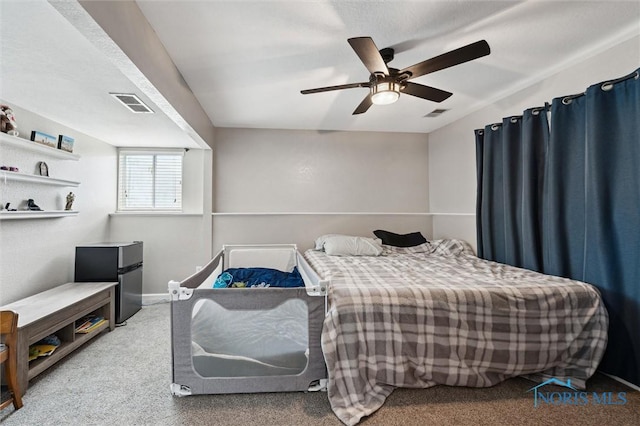 513 Bay River Ct, Maumee, OH 43537 - bedroom with freestanding refrigerator, carpet, a ceiling fan, and baseboards