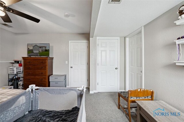 513 Bay River Ct, Maumee, OH 43537 - bedroom with carpet floors, ceiling fan, and baseboards