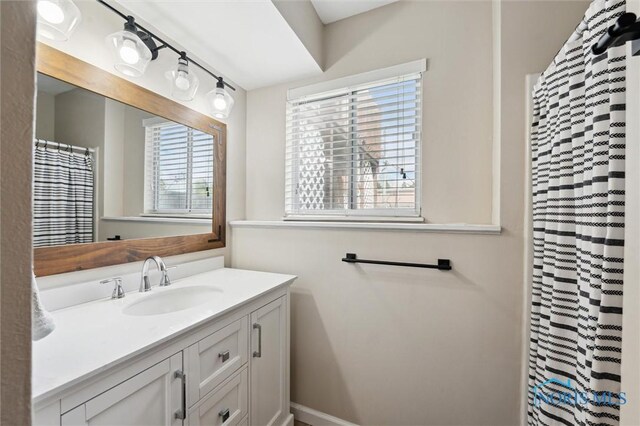 513 Bay River Ct, Maumee, OH 43537 - bathroom with vanity and a shower with shower curtain