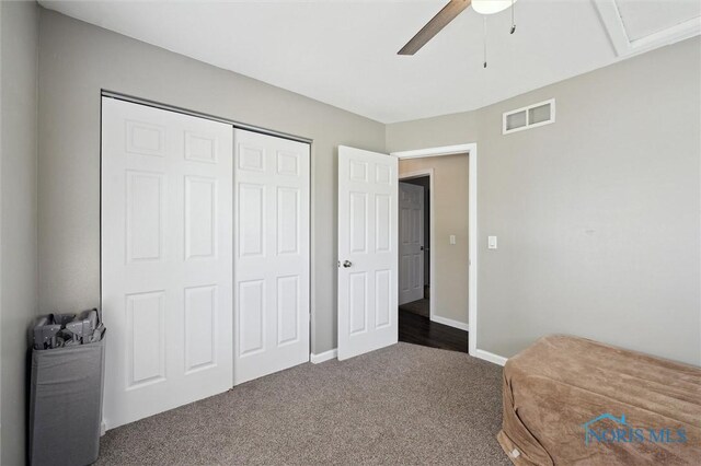 513 Bay River Ct, Maumee, OH 43537 - bedroom with dark colored carpet, a closet, a ceiling fan, and baseboards