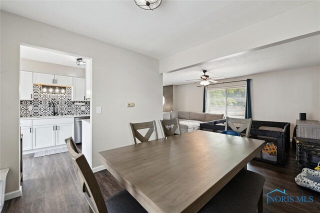 513 Bay River Ct, Maumee, OH 43537 - dining space featuring dark wood-style flooring and ceiling fan