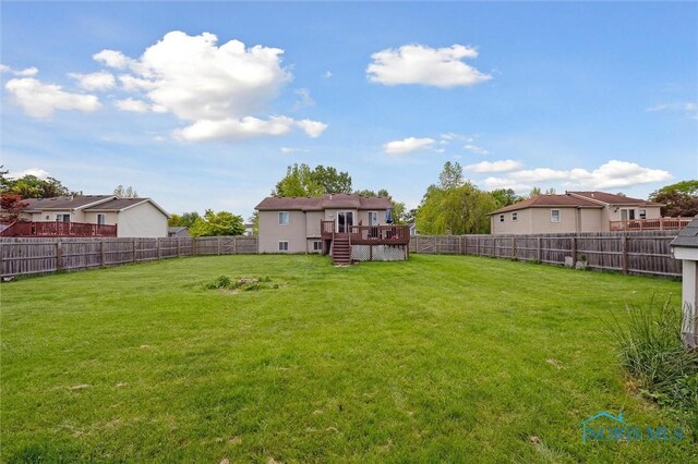 513 Bay River Ct, Maumee, OH 43537 - view of yard with a deck and stairs