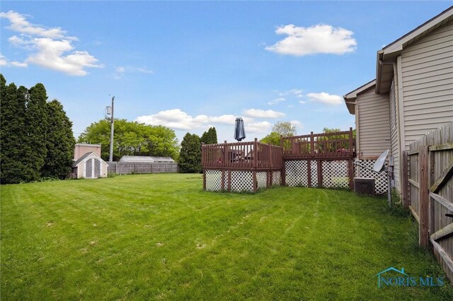 513 Bay River Ct, Maumee, OH 43537 - view of yard with a wooden deck