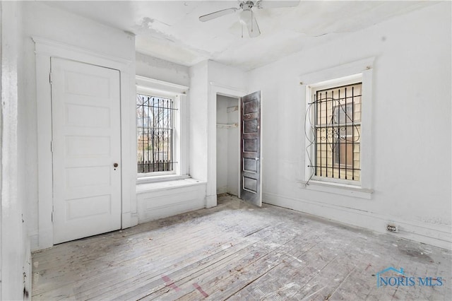 128 W Bancroft St, Toledo, OH 43620 - unfurnished bedroom featuring wood finished floors and ceiling fan