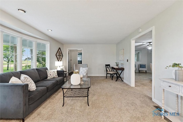 21265 State Route 2, Archbold, OH 43502 - living room with light carpet, baseboards, ceiling fan, and recessed lighting