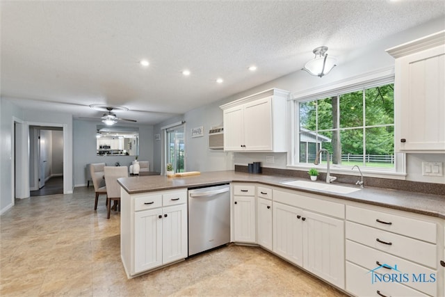 21265 State Route 2, Archbold, OH 43502 - kitchen featuring dishwasher, a sink, a peninsula, recessed lighting, and a ceiling fan