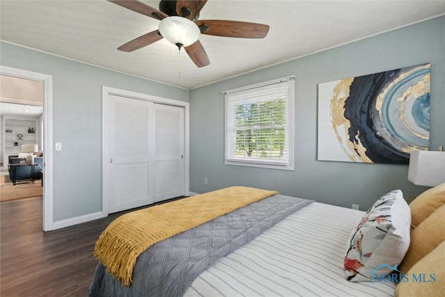 21265 State Route 2, Archbold, OH 43502 - bedroom featuring wood finished floors, a closet, baseboards, and ceiling fan