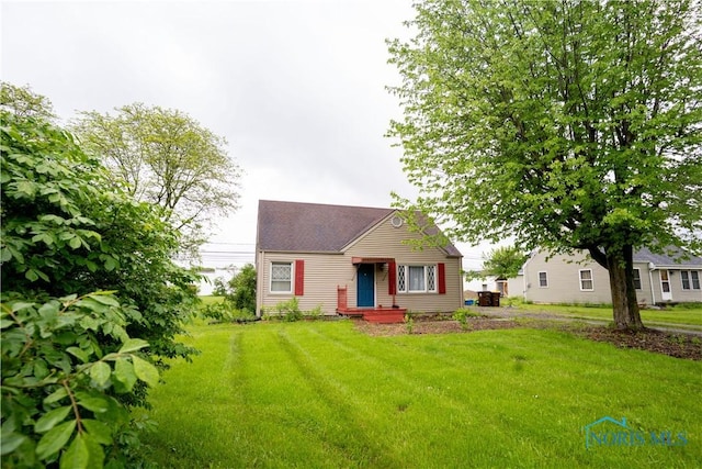 1702 E Hopkins St, Defiance, OH 43512 - view of front of house with a front yard