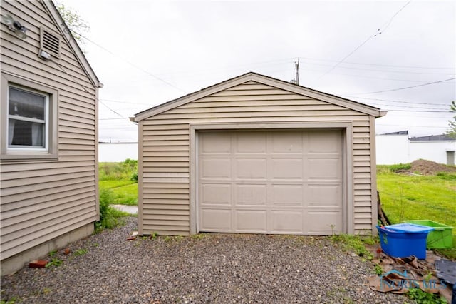 1702 E Hopkins St, Defiance, OH 43512 - detached garage featuring driveway