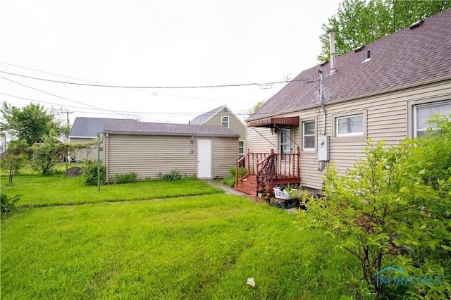 1702 E Hopkins St, Defiance, OH 43512 - view of green lawn featuring an outbuilding