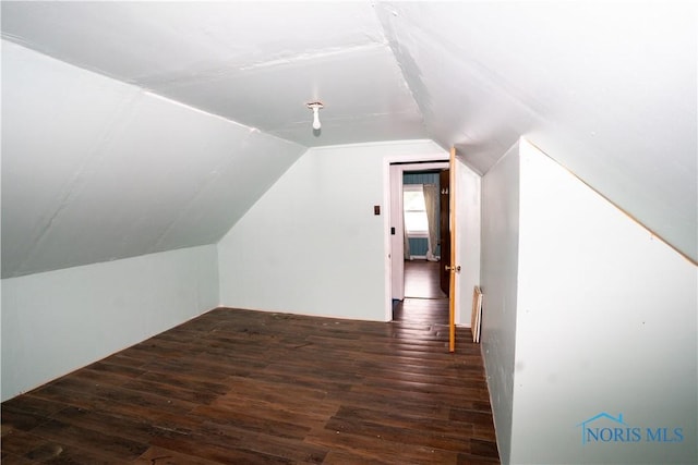 1702 E Hopkins St, Defiance, OH 43512 - bonus room featuring lofted ceiling and wood finished floors