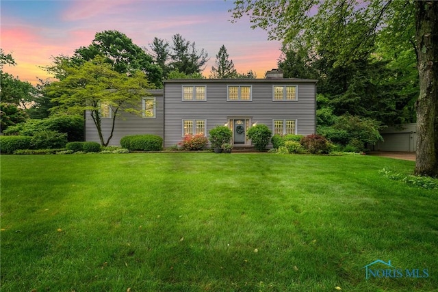 4708 Turnbridge Rd, Toledo, OH 43623 - colonial home with a yard and a chimney