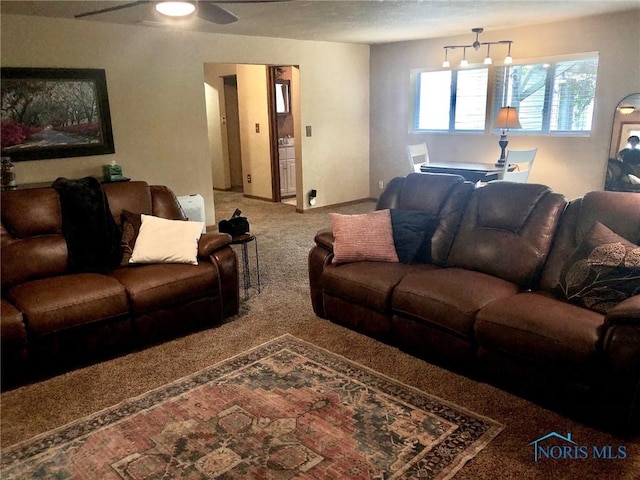 5151 Keller Rd, Walbridge, OH 43465 - carpeted living room featuring a ceiling fan and baseboards