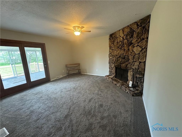 2717 Coveview Dr, Toledo, OH 43611 - unfurnished living room with a textured ceiling, a ceiling fan, carpet, french doors, and baseboards