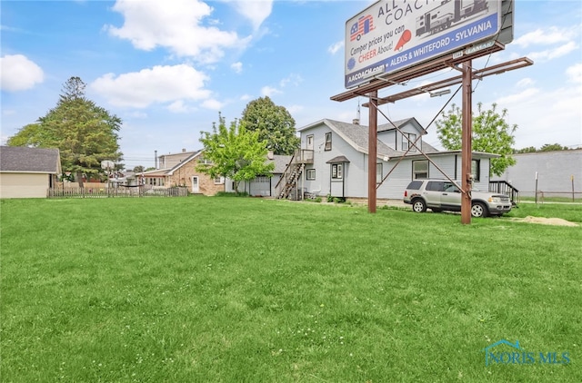 4927 N Summit St, Toledo, OH 43611 - view of yard featuring stairway