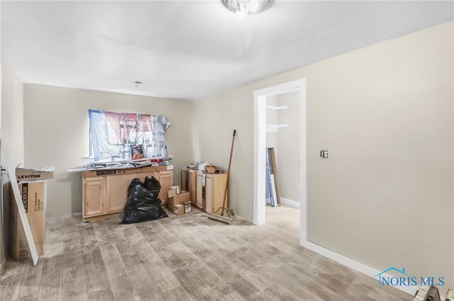 4927 N Summit St, Toledo, OH 43611 - living room featuring light wood finished floors