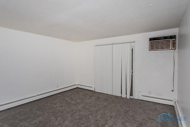 2340 Torrey Hill Dr, Toledo, OH 43606 - additional living space with an AC wall unit, carpet floors, and baseboard heating
