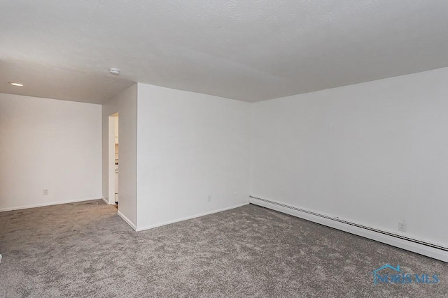 2340 Torrey Hill Dr, Toledo, OH 43606 - empty room featuring a baseboard radiator, carpet floors, and baseboards