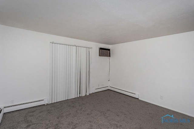 2340 Torrey Hill Dr, Toledo, OH 43606 - unfurnished room with a baseboard heating unit, carpet, and a wall unit AC