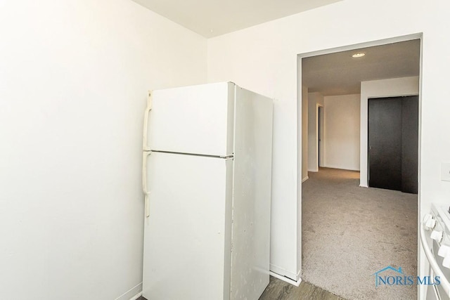 2340 Torrey Hill Dr, Toledo, OH 43606 - kitchen with freestanding refrigerator and baseboards