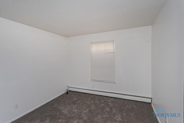 2340 Torrey Hill Dr, Toledo, OH 43606 - empty room with a baseboard heating unit, carpet floors, and baseboards