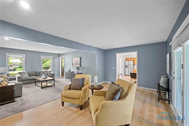 1956 Thornapple Dr, Toledo, OH 43614 - living area with light wood-type flooring and baseboards