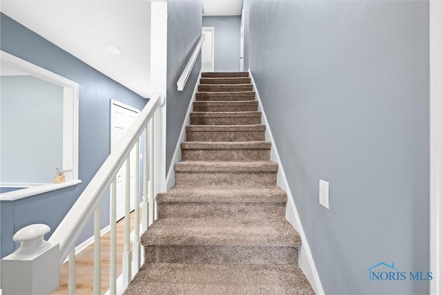 1956 Thornapple Dr, Toledo, OH 43614 - stairway featuring baseboards