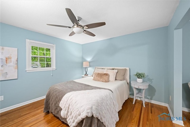 1956 Thornapple Dr, Toledo, OH 43614 - bedroom featuring wood finished floors, baseboards, and ceiling fan