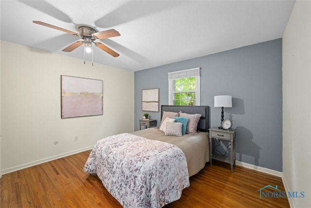 1956 Thornapple Dr, Toledo, OH 43614 - bedroom featuring wood finished floors, baseboards, and ceiling fan
