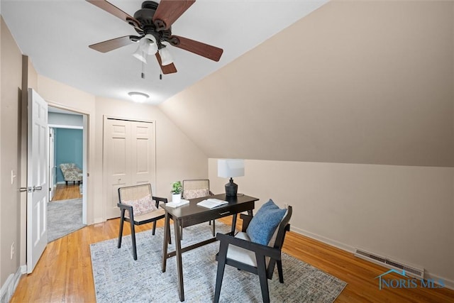 1956 Thornapple Dr, Toledo, OH 43614 - office featuring baseboard heating, light wood-type flooring, a ceiling fan, baseboards, and lofted ceiling