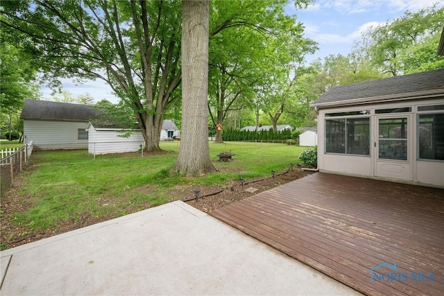 1956 Thornapple Dr, Toledo, OH 43614 - view of patio / terrace with an outbuilding and a deck