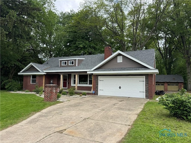 1226 Champe Rd, Toledo, OH 43615 - view of front of property with brick siding, a shingled roof, a front lawn, an attached garage, and a chimney