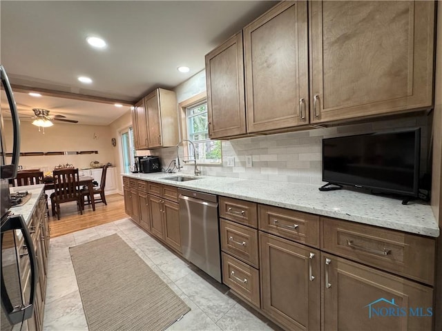 1226 Champe Rd, Toledo, OH 43615 - kitchen featuring dishwasher, a sink, decorative backsplash, ceiling fan, and recessed lighting