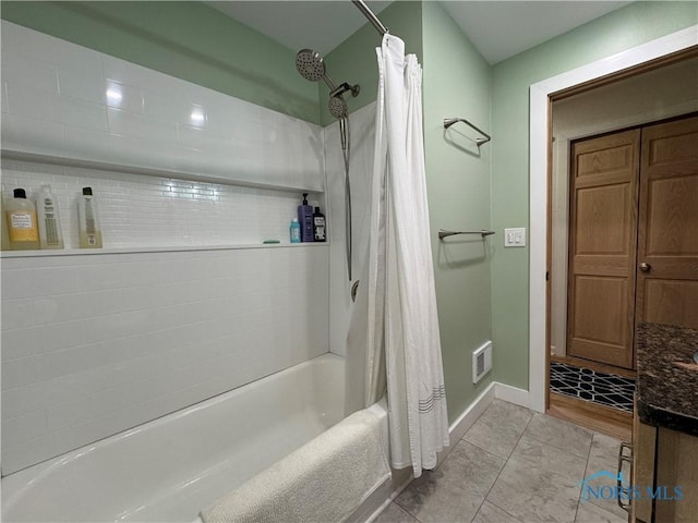 1226 Champe Rd, Toledo, OH 43615 - bathroom featuring shower / tub combo with curtain and baseboards