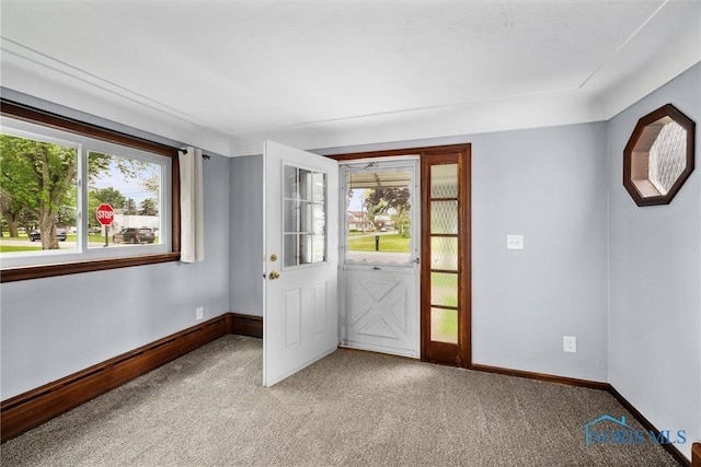 503 Church St, Helena, OH 43435 - entryway with baseboards and light colored carpet
